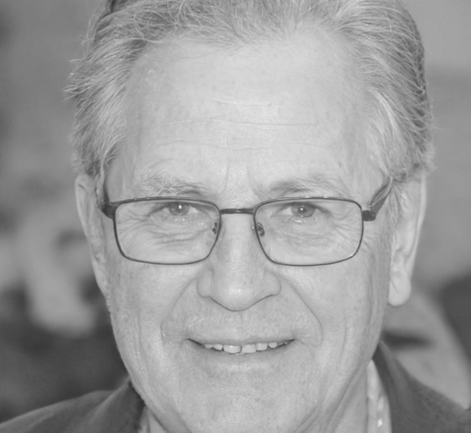 Lachlan O'Sullivan reviewing budget materials