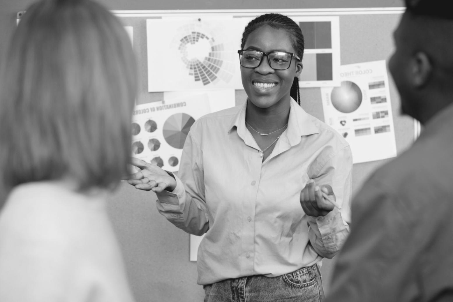 Finance team collaborating on budget presentation